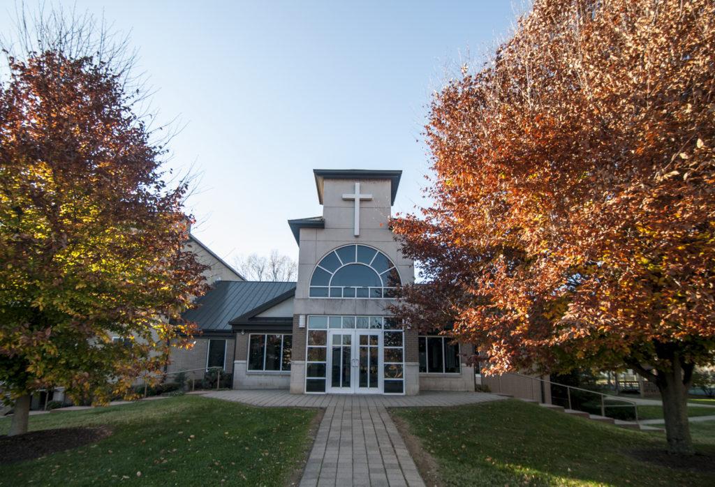 Immaculate Heart of Mary Chapel surrounded by fall leaves